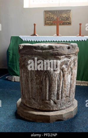 An old font in St. Peter and St. Paul`s Church, Hathern, Leicestershire, England, UK Stock Photo